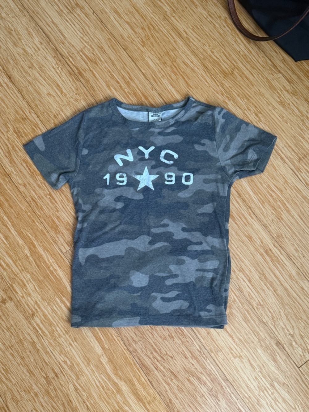 Urban Outfitters NYC 1990 Graphic Camo Baby Tee